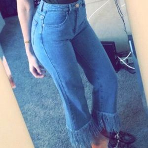 Forever 21 jeans size 26 with fringe at the bottom